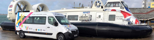 minibus next to hovercraft