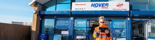 Hovertravel staff in front of Hovertravel port